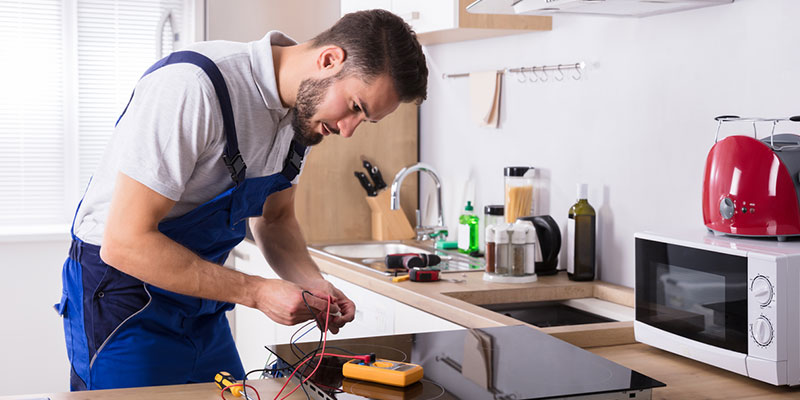 a residential electrician works on residential properties